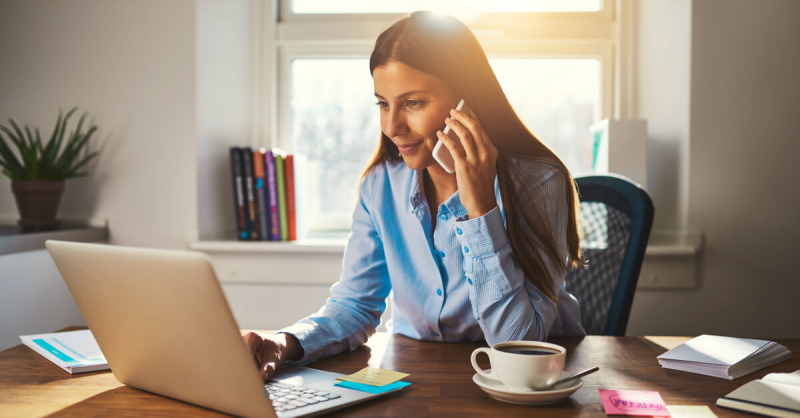 woman in home office with natural lighting